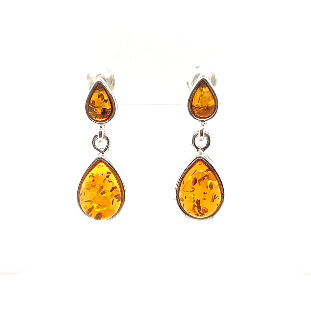 
                  
                    Double Teardrop Baltic Amber Earrings, a healing stone by Super Silver.
                  
                
