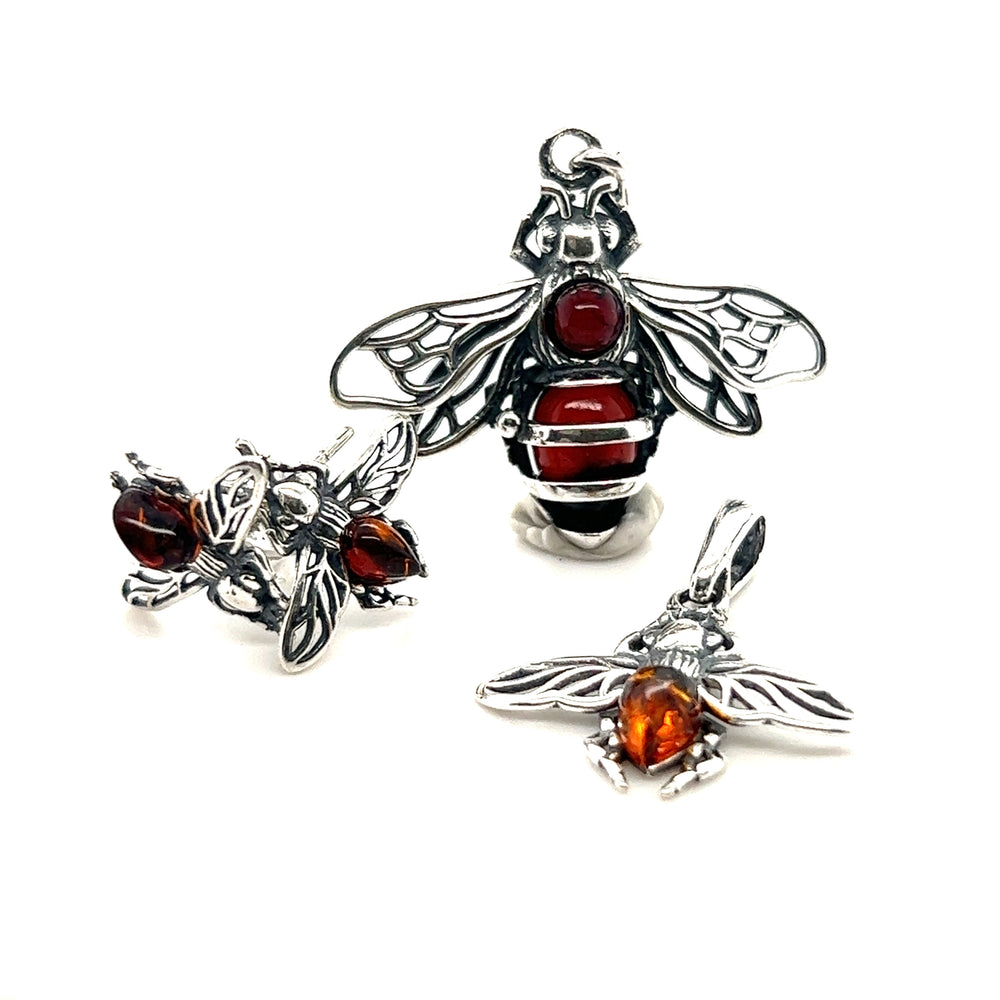 
                  
                    A stunning Super Silver bee necklace paired with matching Detailed Baltic Amber Bee Studs earrings.
                  
                