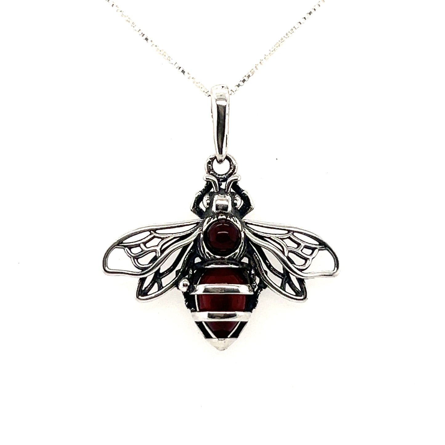 
                  
                    A Charming Amber Bee Pendant by Super Silver with garnet stones on a .925 sterling silver chain.
                  
                
