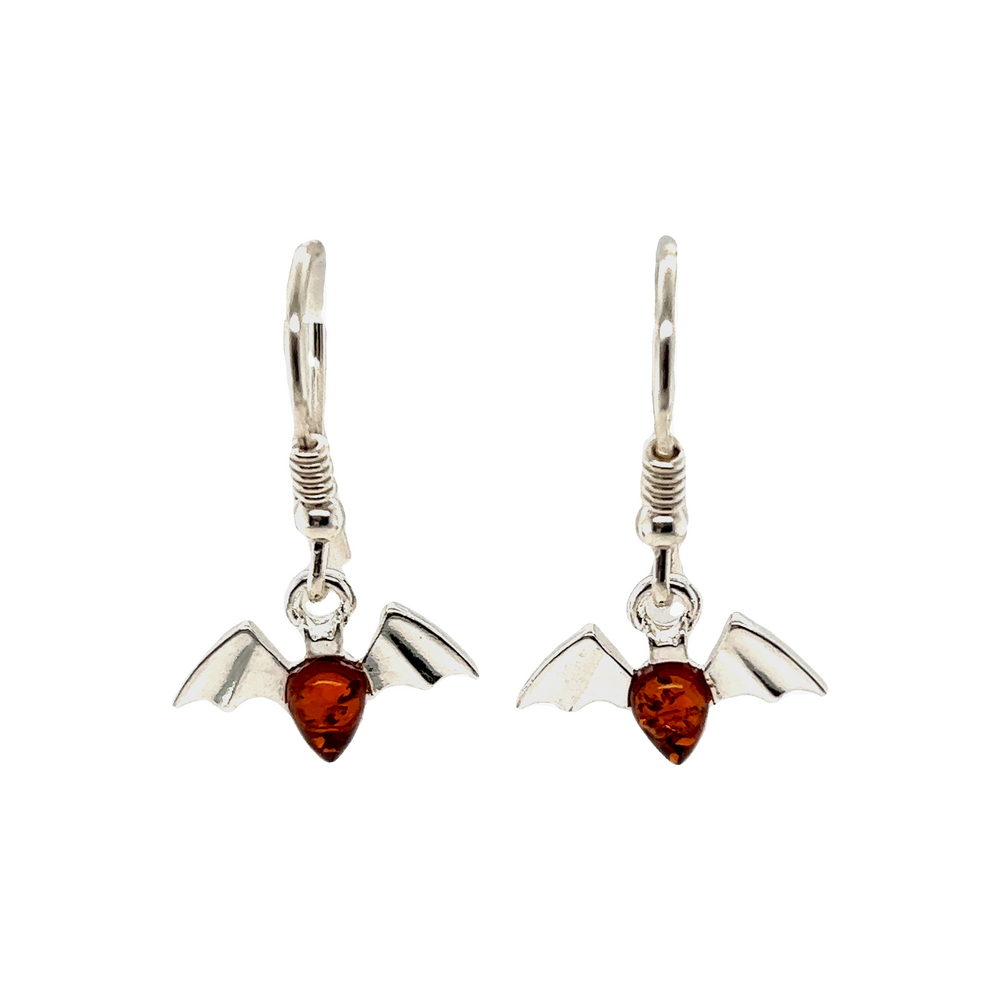 A pair of Enchanting Baltic Amber Bat Earrings accented with Super Silver stones.