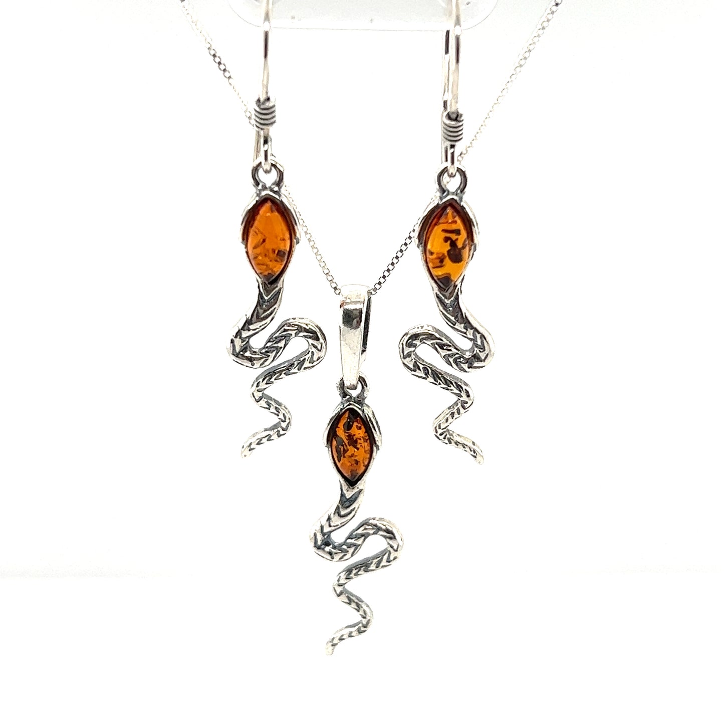 
                  
                    This set features a stunning Baltic amber necklace and Super Silver Alluring Amber Snake Earrings. The earrings showcase a unique snake design, perfectly complementing the warm cognac amber of the necklace.
                  
                
