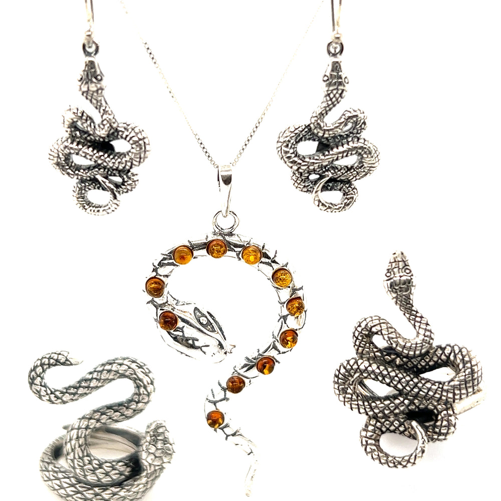 
                  
                    A set of mesmerizing Super Silver sterling silver snake earrings, necklace, and bracelet featuring a deep cognac Large Amber Snake pendant.
                  
                