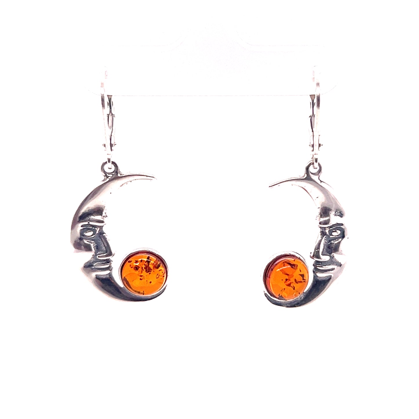 A pair of Super Silver Amber Man-in-the-Moon Earrings featuring a crescent moon design.