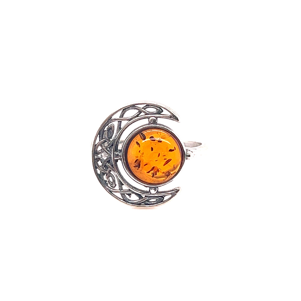A Super Silver Celtic Amber Crescent Moon Ring with a crescent shaped Baltic amber stone.