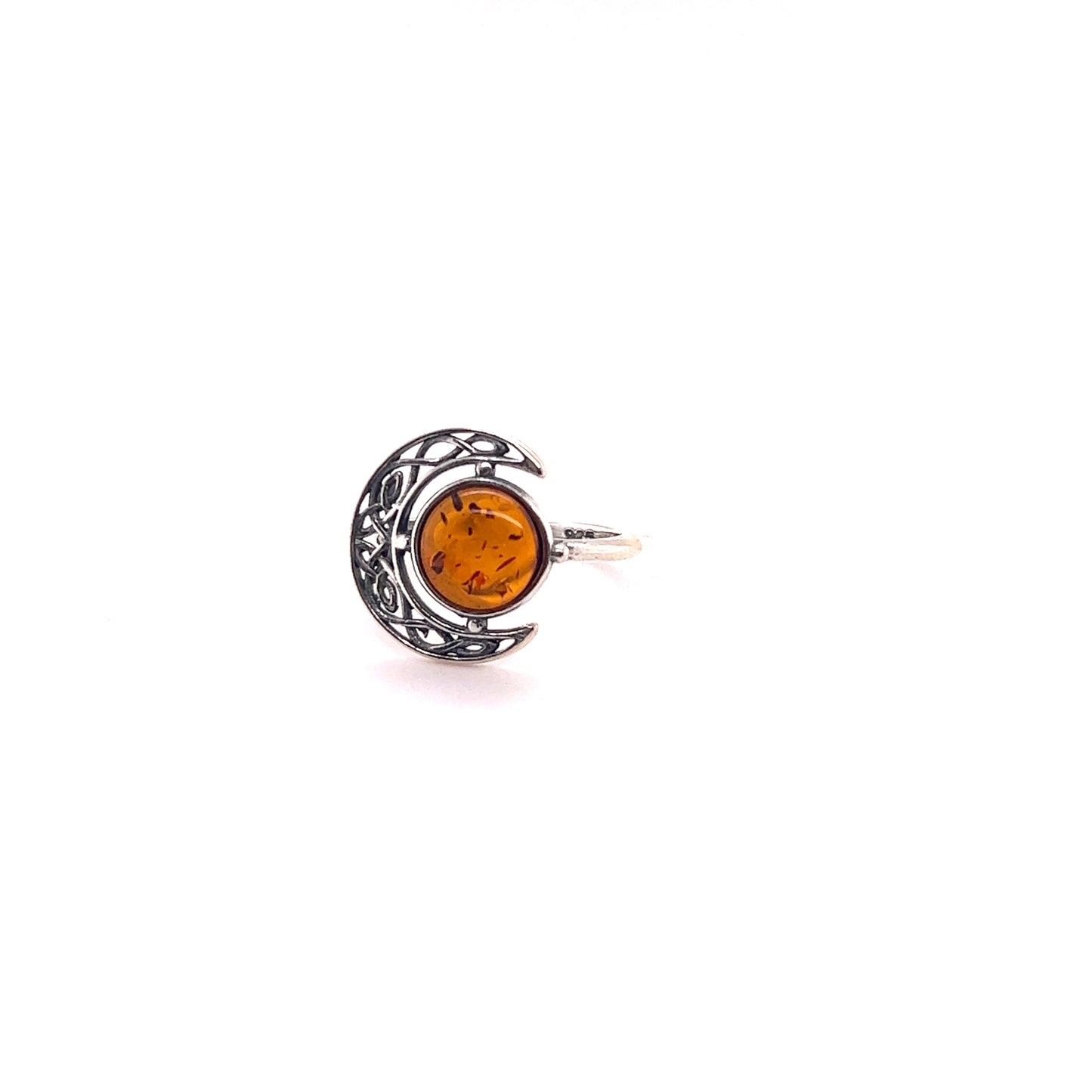 A Super Silver Celtic Amber Crescent Moon Ring, featuring a crescent moon and Baltic amber stone, reflecting the captivating beauty of moon phases.
