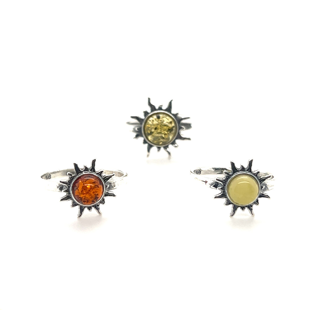 Product description: The Brilliant Dainty Amber Sun Ring by Super Silver. Perfect for adding a touch of elegance and warmth to any outfit, these stunning rings showcase beautiful amber and yellow stones. Made to be durable and eye-catching.