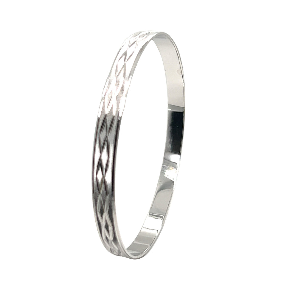 A Super Silver Brilliant Diamond Etched Bangle with an intricate design.