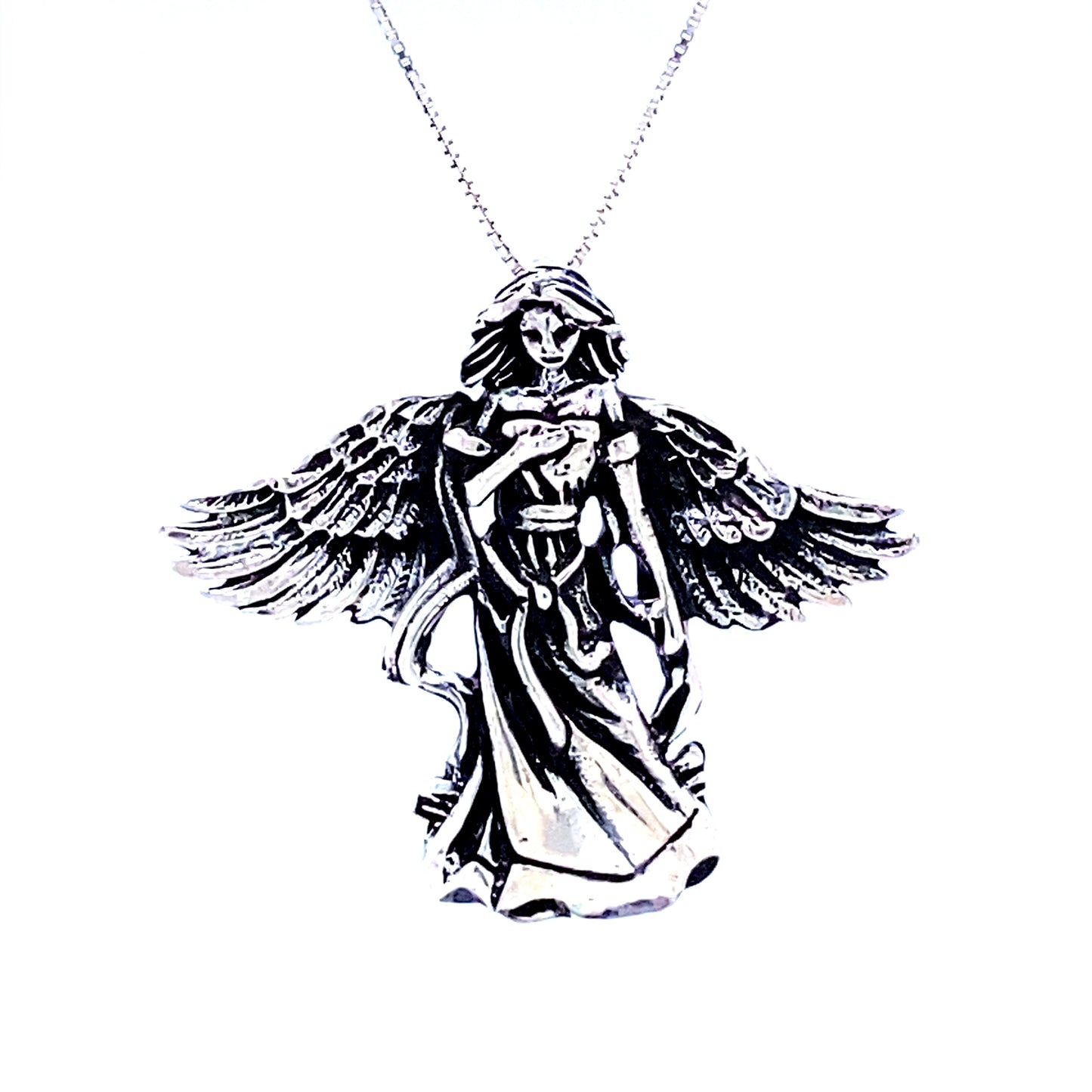 A Super Silver Flowing Angel Pendant With Hand Over Heart with wings on a necklace.