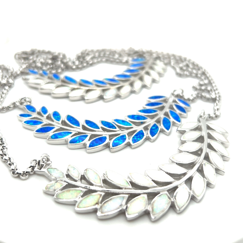 A Stunning Opal Branch Necklace from Super Silver with blue opal leaves and a rhodium finish.