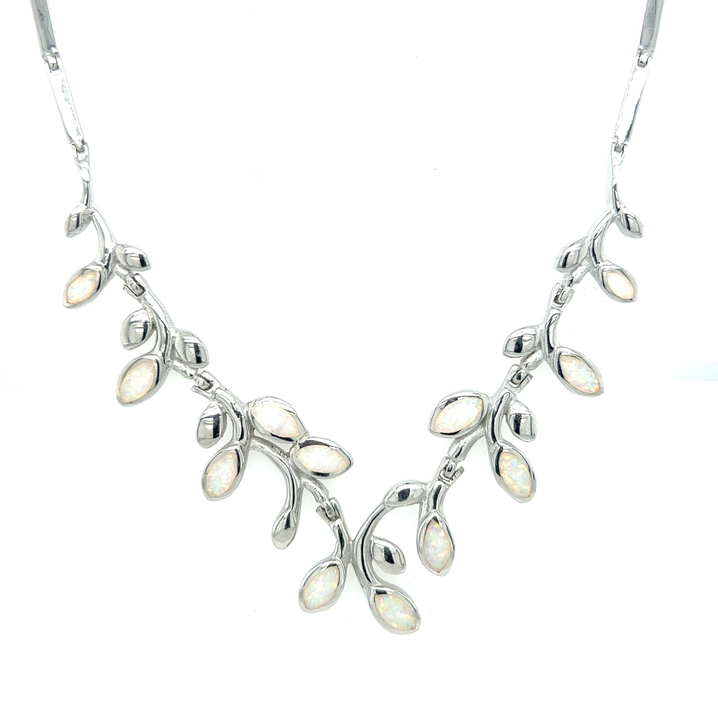 
                  
                    A Super Silver elegant opal vine necklace featuring opal stones and delicate silver leaves.
                  
                