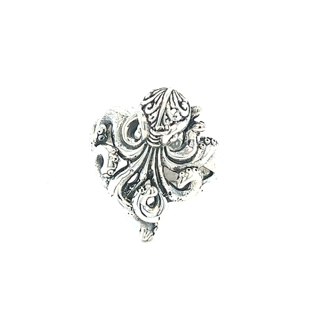 An Intricate Filigree Designer Octopus Ring with artisan-made tentacles on a white background.