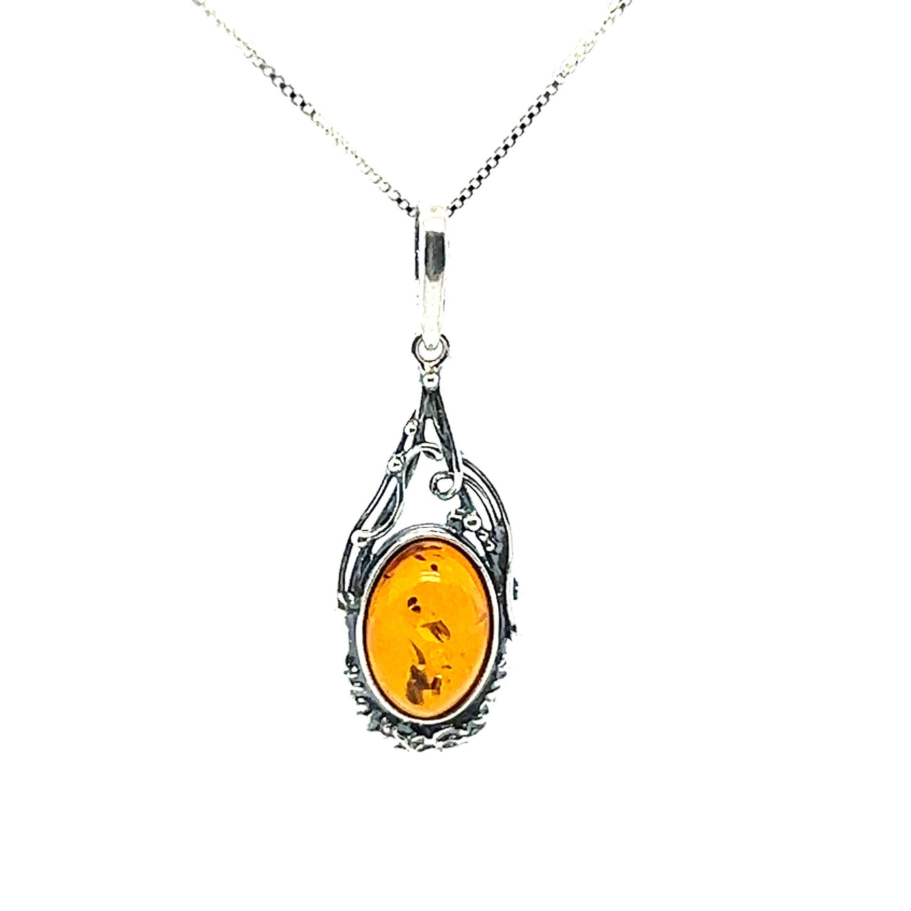 A Super Silver Antique Style Amber Pendant.
