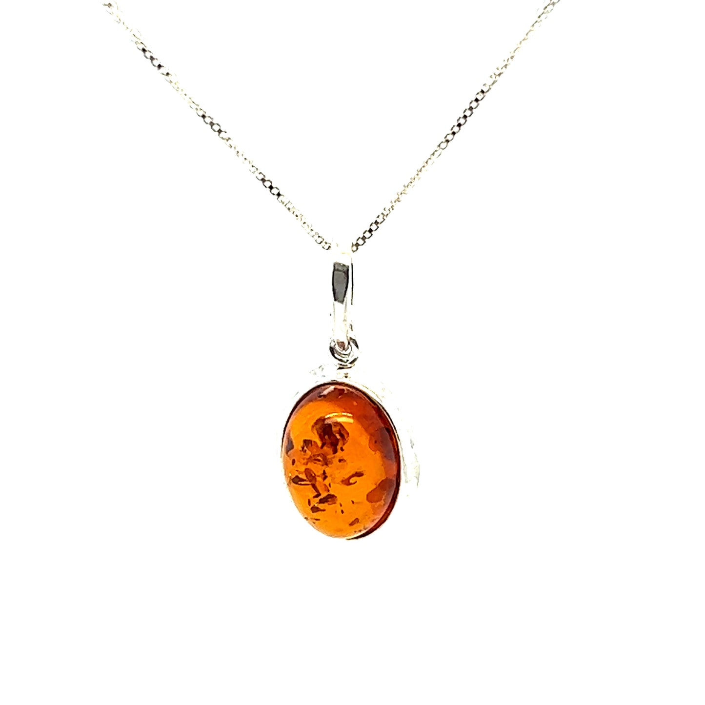 A necklace with a Simple Framed Oval Amber Pendant on a Super Silver sterling silver chain.