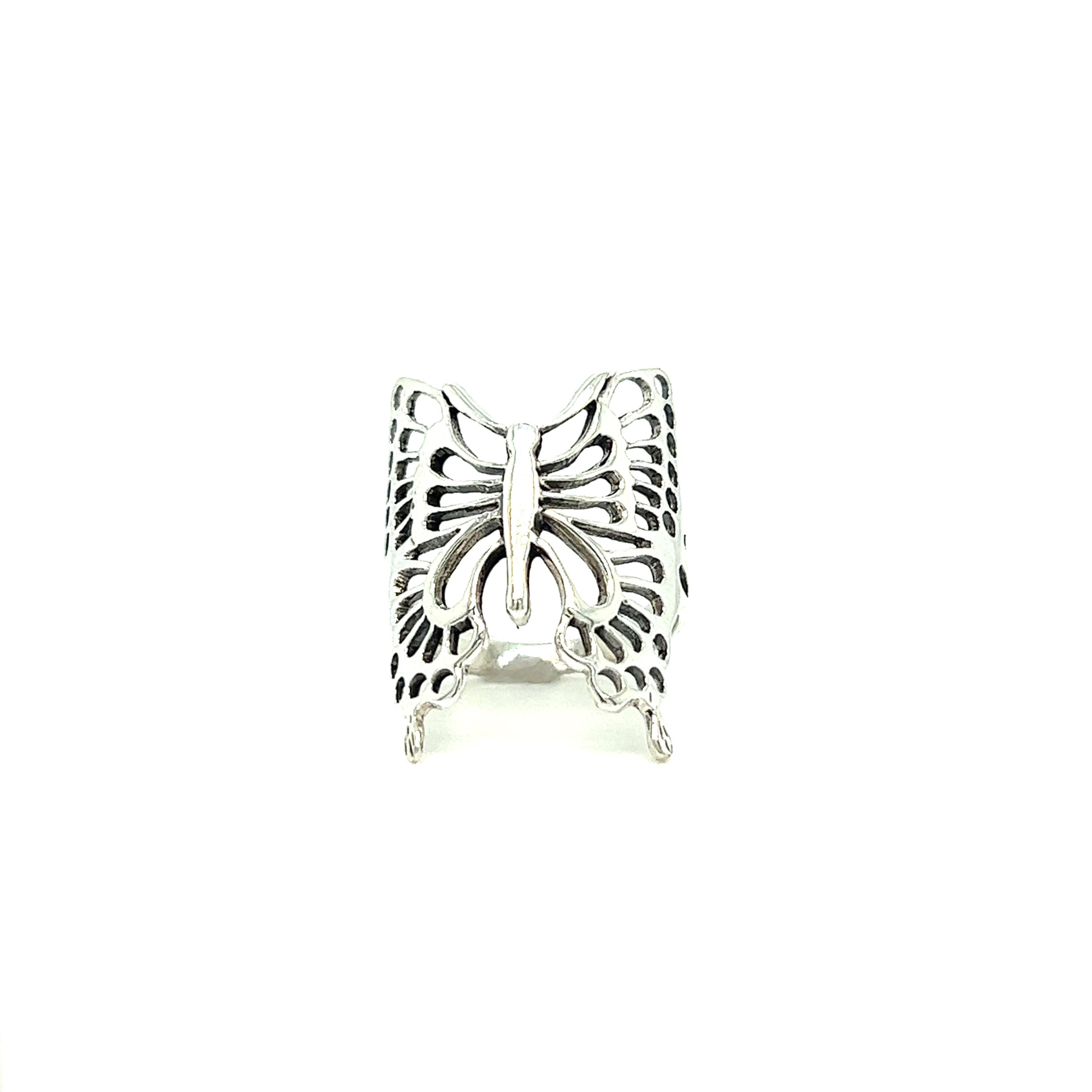 A minimalist Statement Butterfly Ring on a white background.