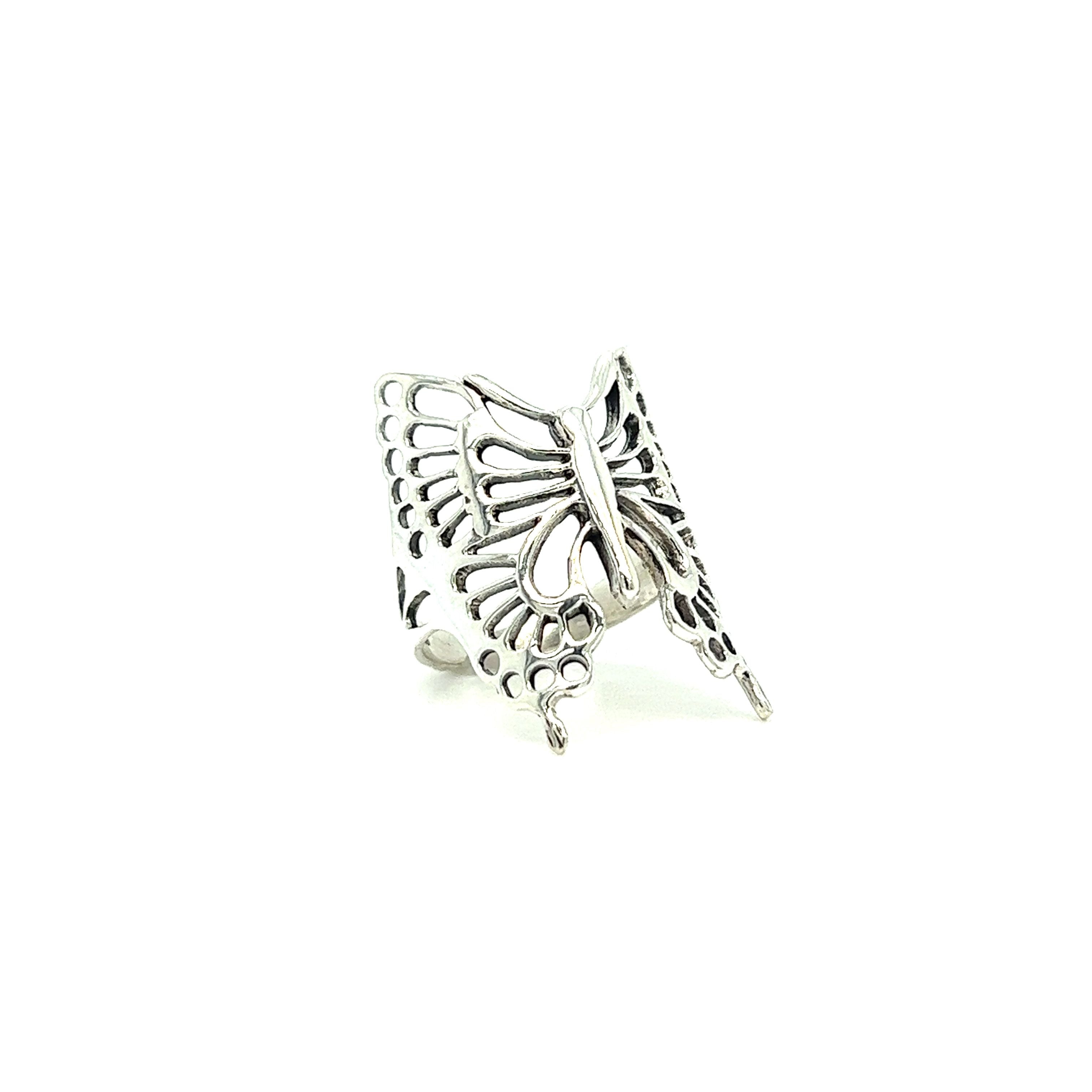 A Statement Butterfly Ring by Super Silver symbolizing hope for transformation, showcased against a serene white background.