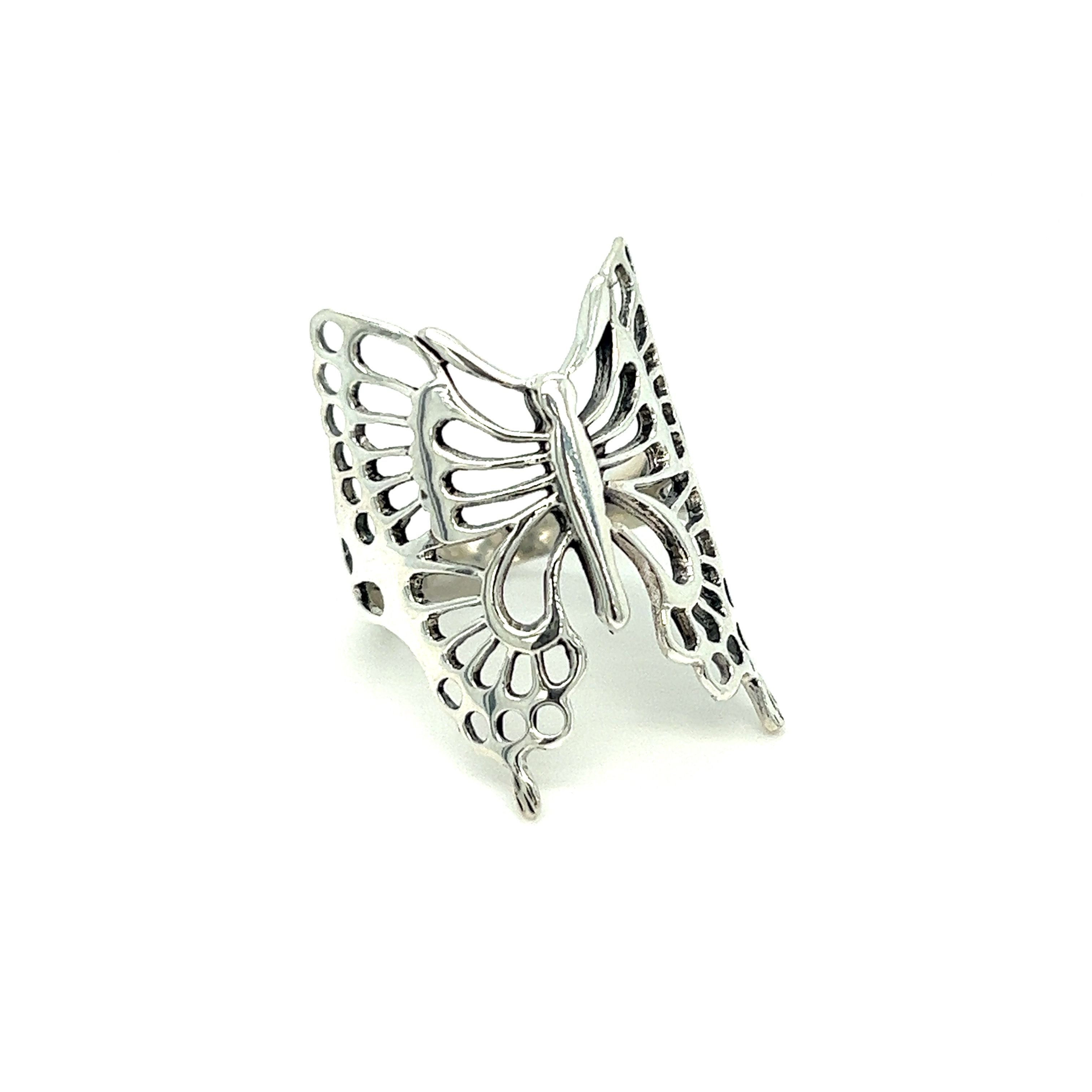 A minimalist Statement Butterfly Ring on a white background.