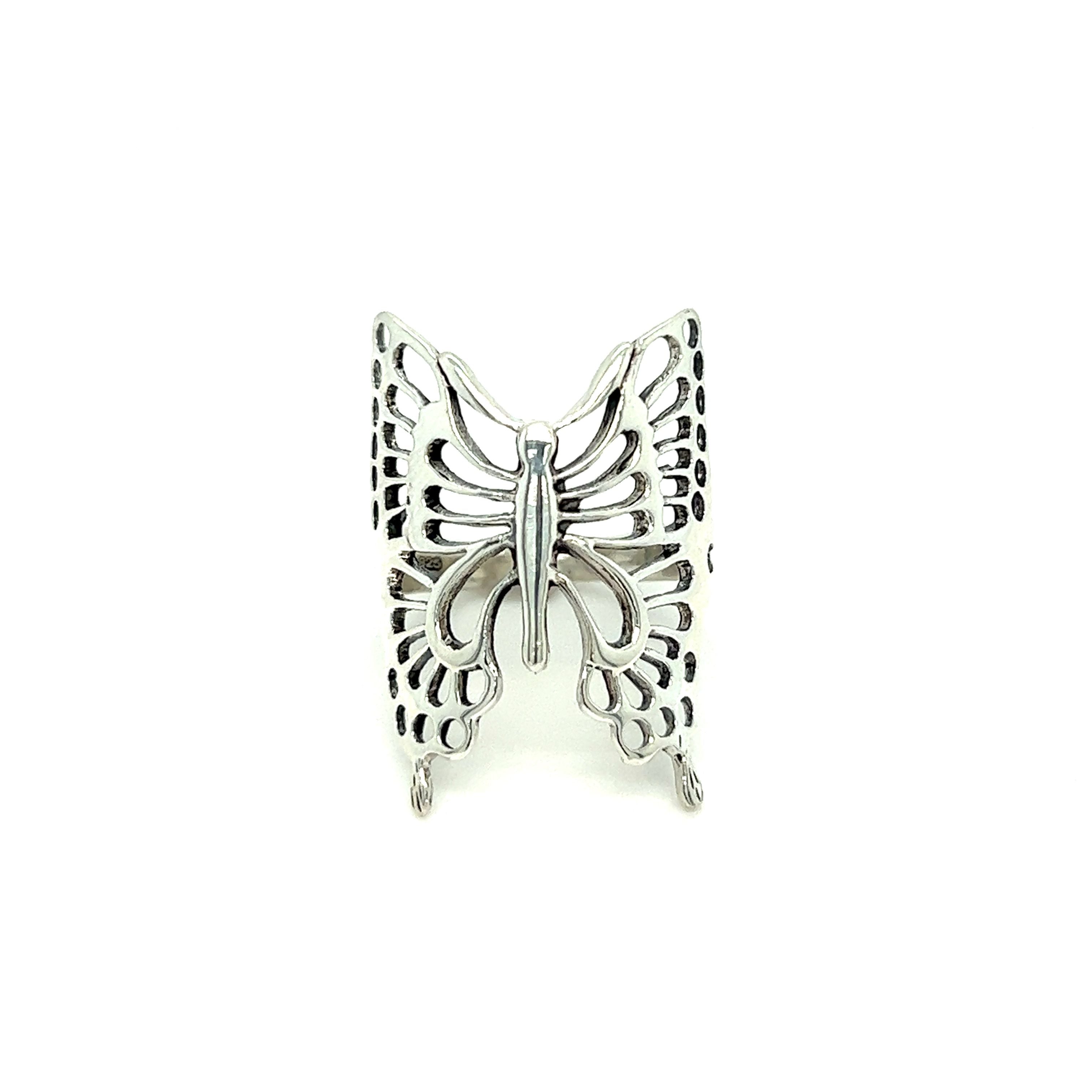 A minimalist Statement Butterfly Ring on a white background.
