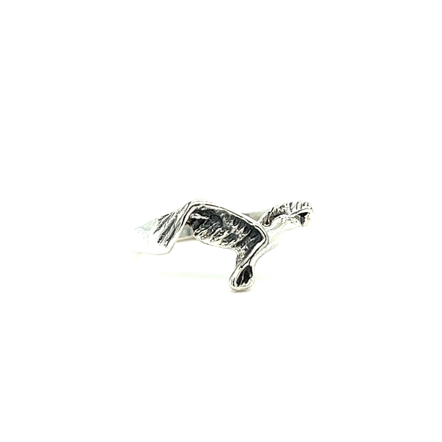 A Dainty Flying Seagull Ring by Super Silver with a horse on it.