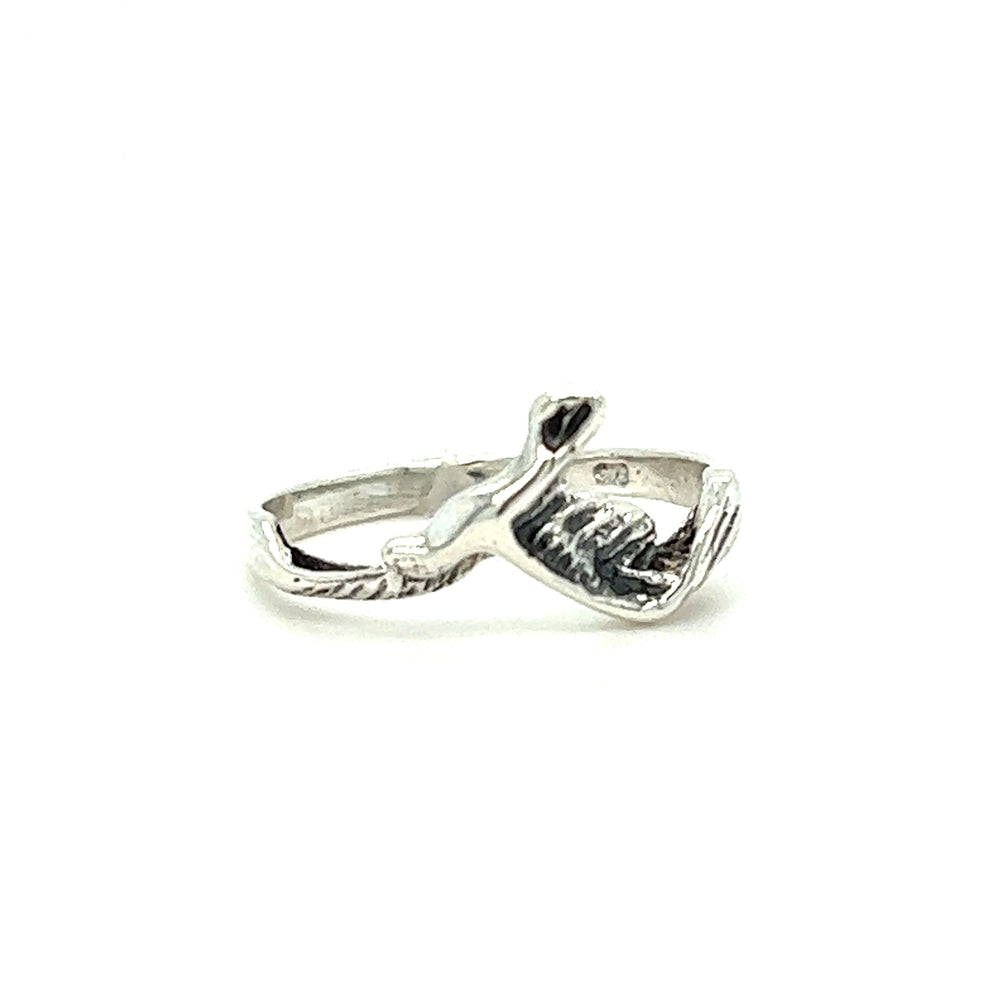 
                  
                    A Dainty Flying Seagull Ring with a fish and bird on it, inspired by the ocean coast and seagulls, made by Super Silver.
                  
                
