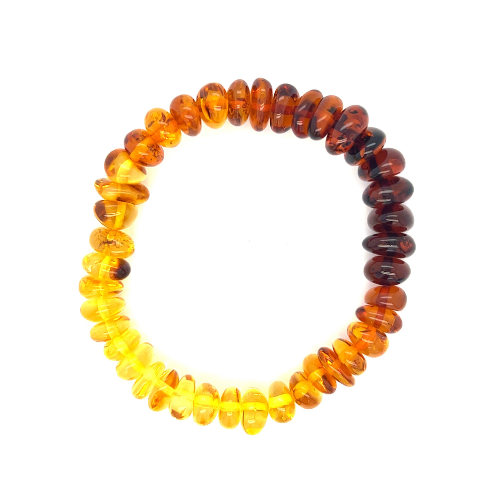 This Outstanding Baltic Amber Rondelle Beaded Bracelet from Super Silver is the perfect addition to your boho vintage style collection. Embodying the healing stone properties of amber, this stretch bracelet is a must-have accessory.