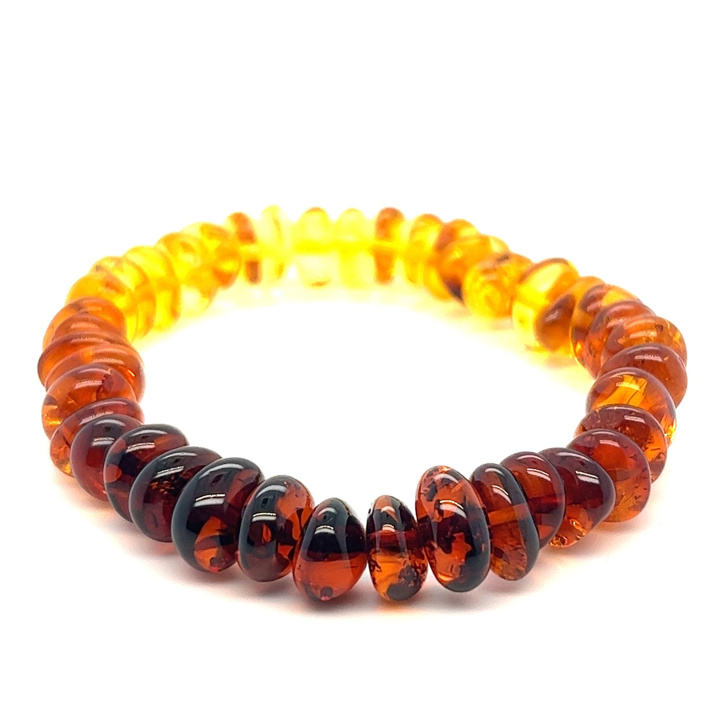 
                  
                    Outstanding Baltic Amber Rondelle Beaded Bracelet in boho vintage style by Super Silver.
                  
                