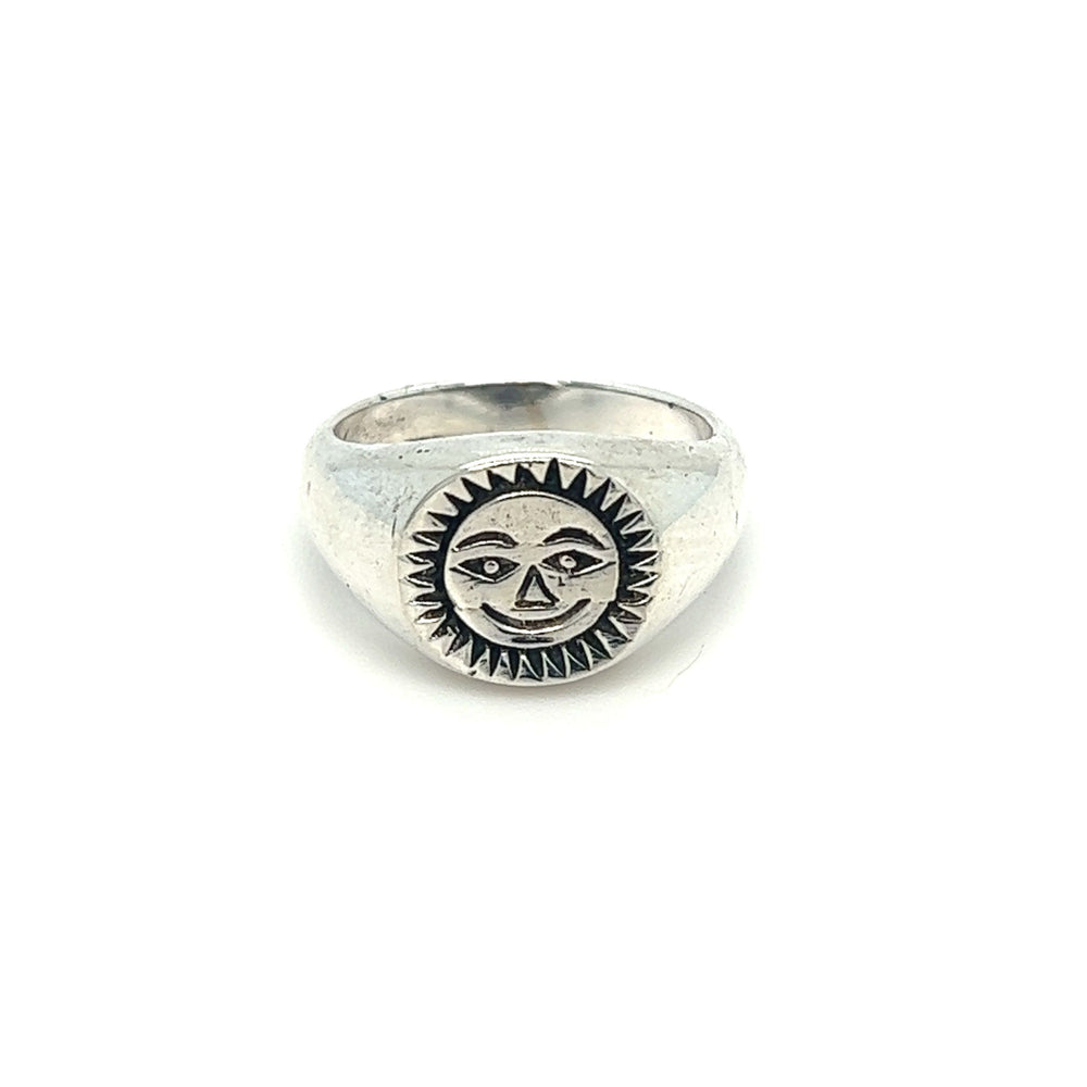 A Smiling Sun Signet Ring with a sun face on it by Super Silver.