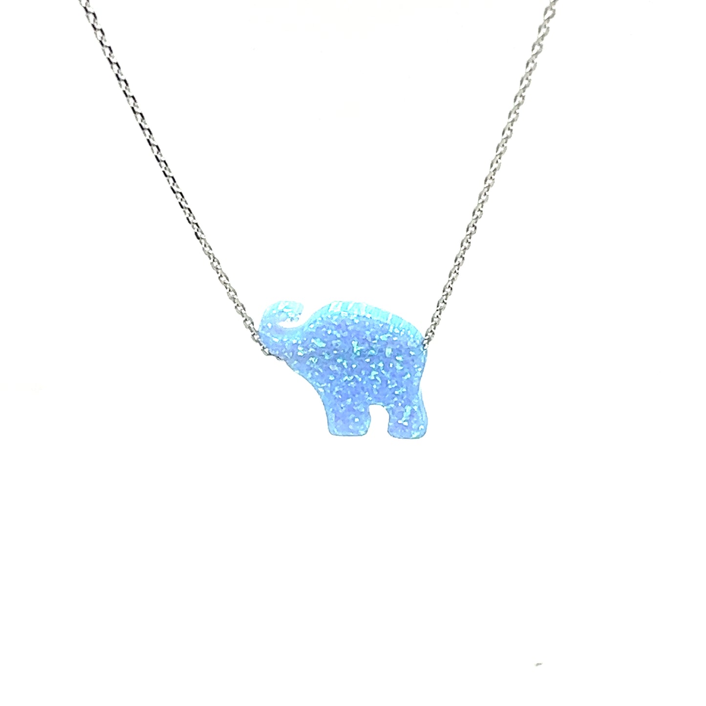 
                  
                    A Super Silver Blue Opal Elephant Necklace with a boho vibe, featuring a striking ocean blue stone.
                  
                