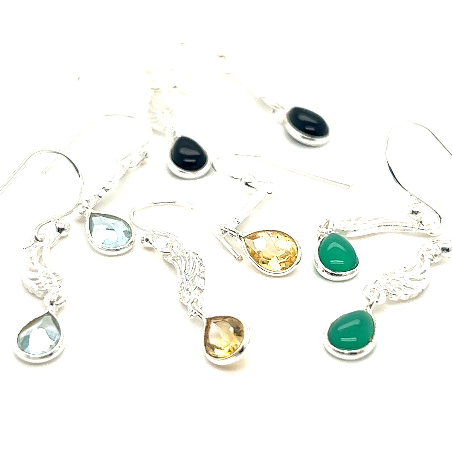 
                  
                    A set of Super Silver angel wing earrings adorned with a variety of colorful stones, including teardrop shaped stones. Incorporating SEO keywords ensures these stunning earrings are easily discoverable by online shoppers seeking statement jewelry pieces.
                  
                