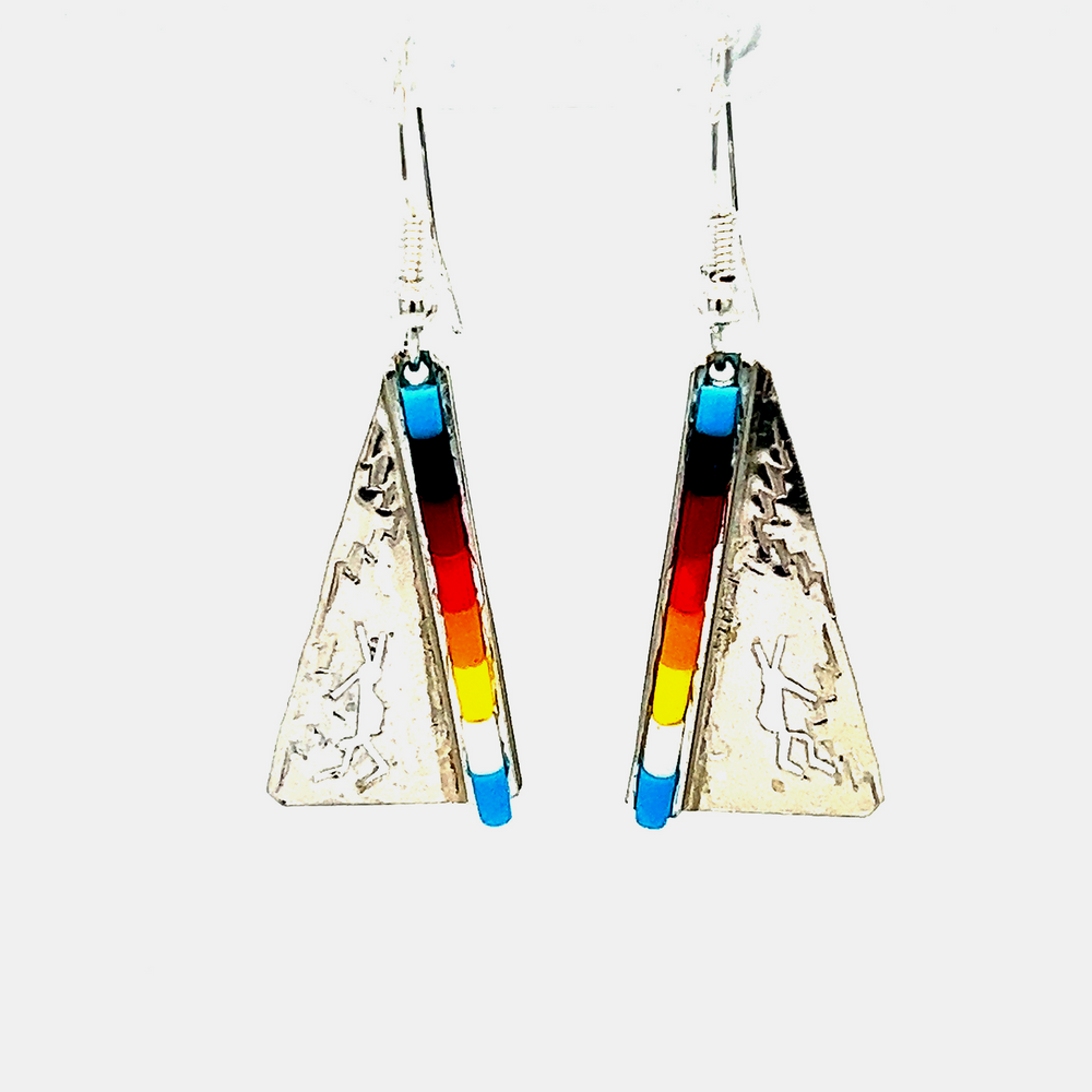 A pair of Super Silver Native Triangular Earrings with Dancing Kokopelli and multi colored beads, perfect to complement a southwest-inspired look.
