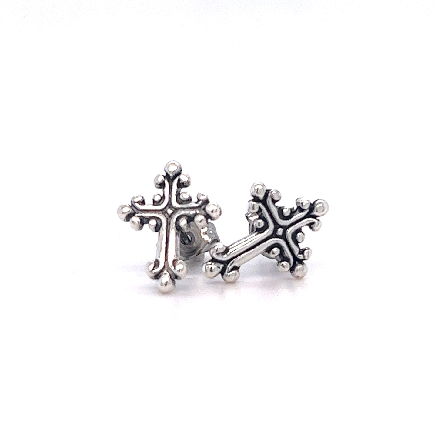 A pair of Super Silver Ornate Cross Studs with oxidized detailing.