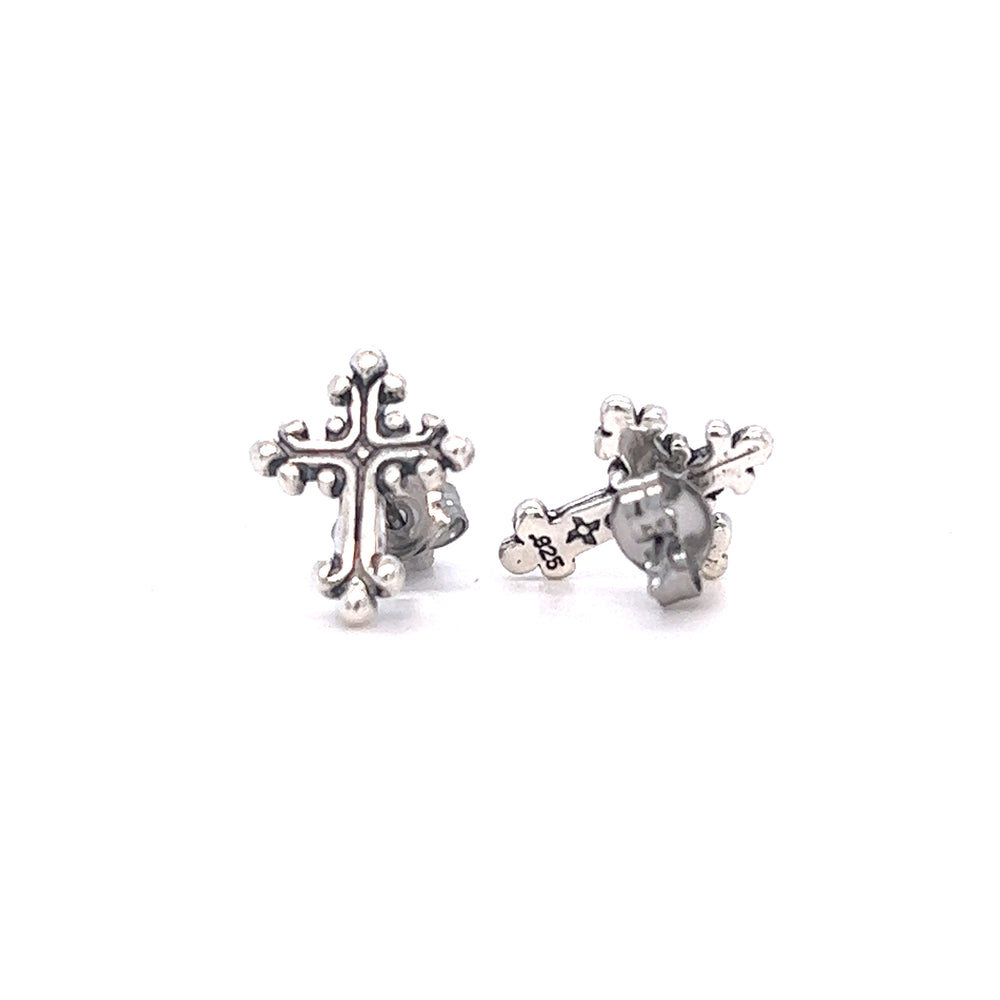 
                  
                    Ornate Cross Studs by Super Silver on white background.
                  
                