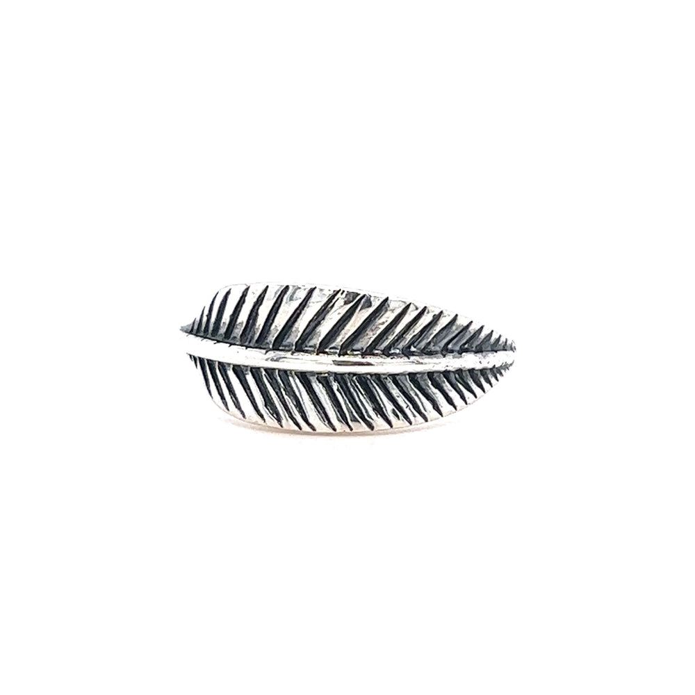 A Super Silver oxidized feather ring with a leaf on it.