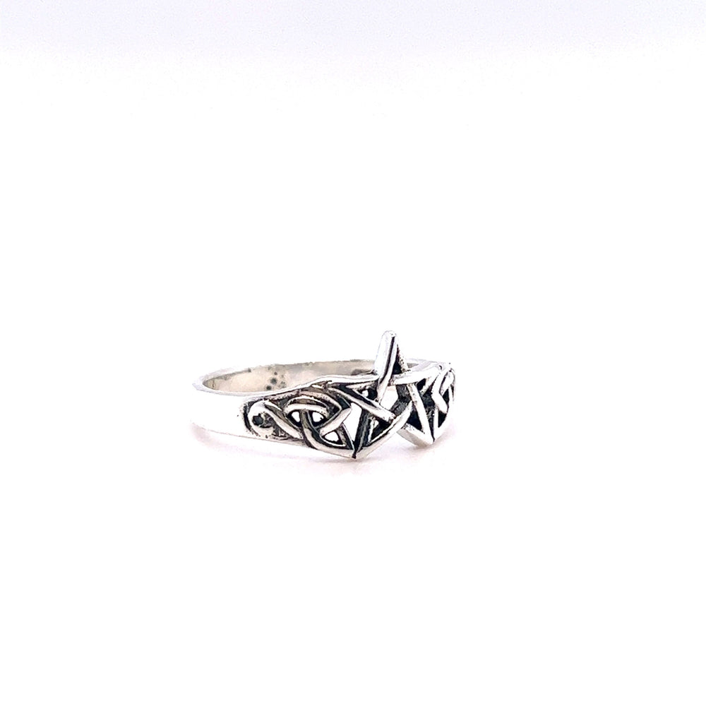 
                  
                    Small Pentagram Ring with Celtic Knot Design crafted in sterling silver.
                  
                