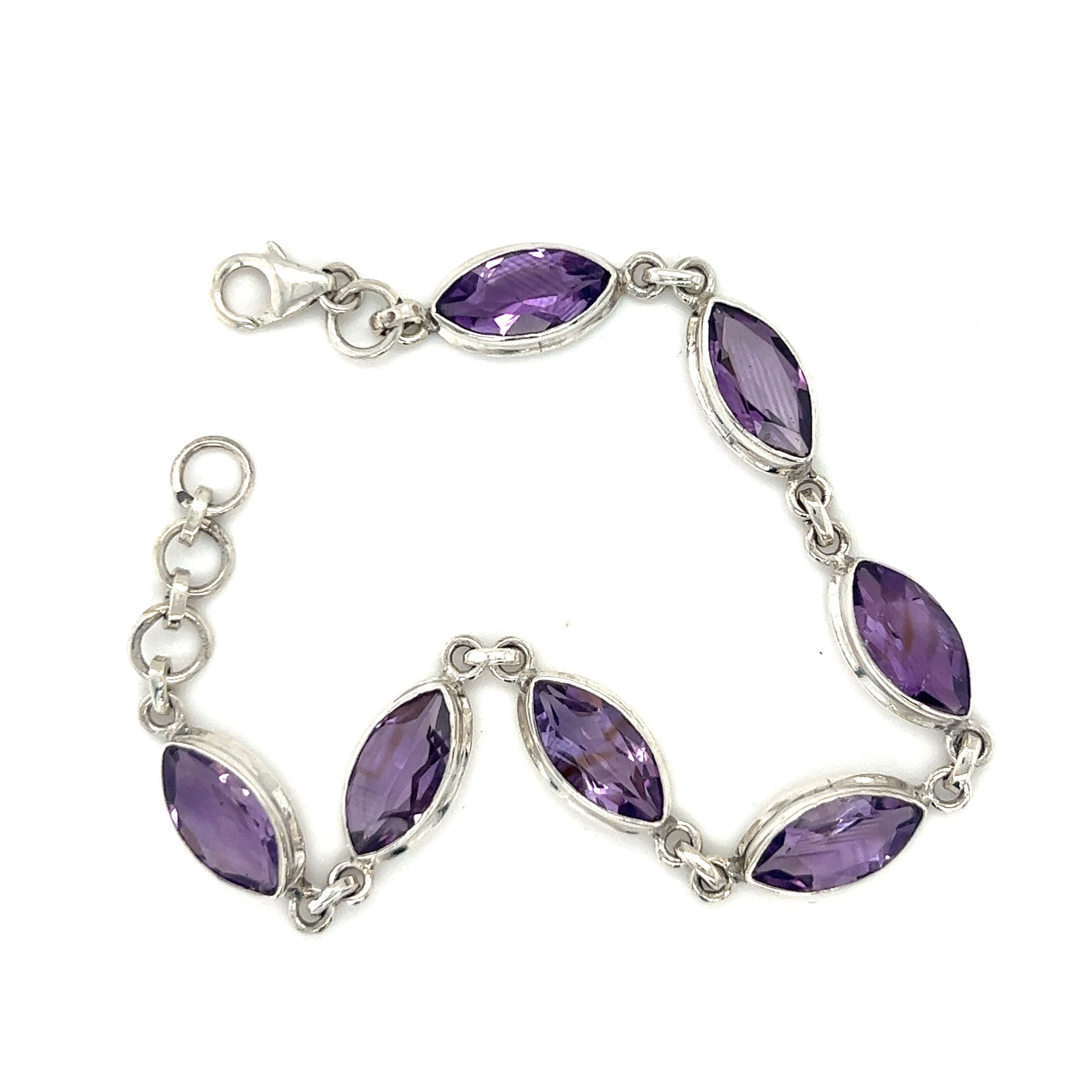 Stunning Amethyst Marquise Shaped Bracelet - a stunning piece of jewelry made with amethyst stones set in a beautiful sterling silver setting. This elegant accessory not only adds a touch of style to any outfit but also carries the potential. (Brand Name: Super Silver)