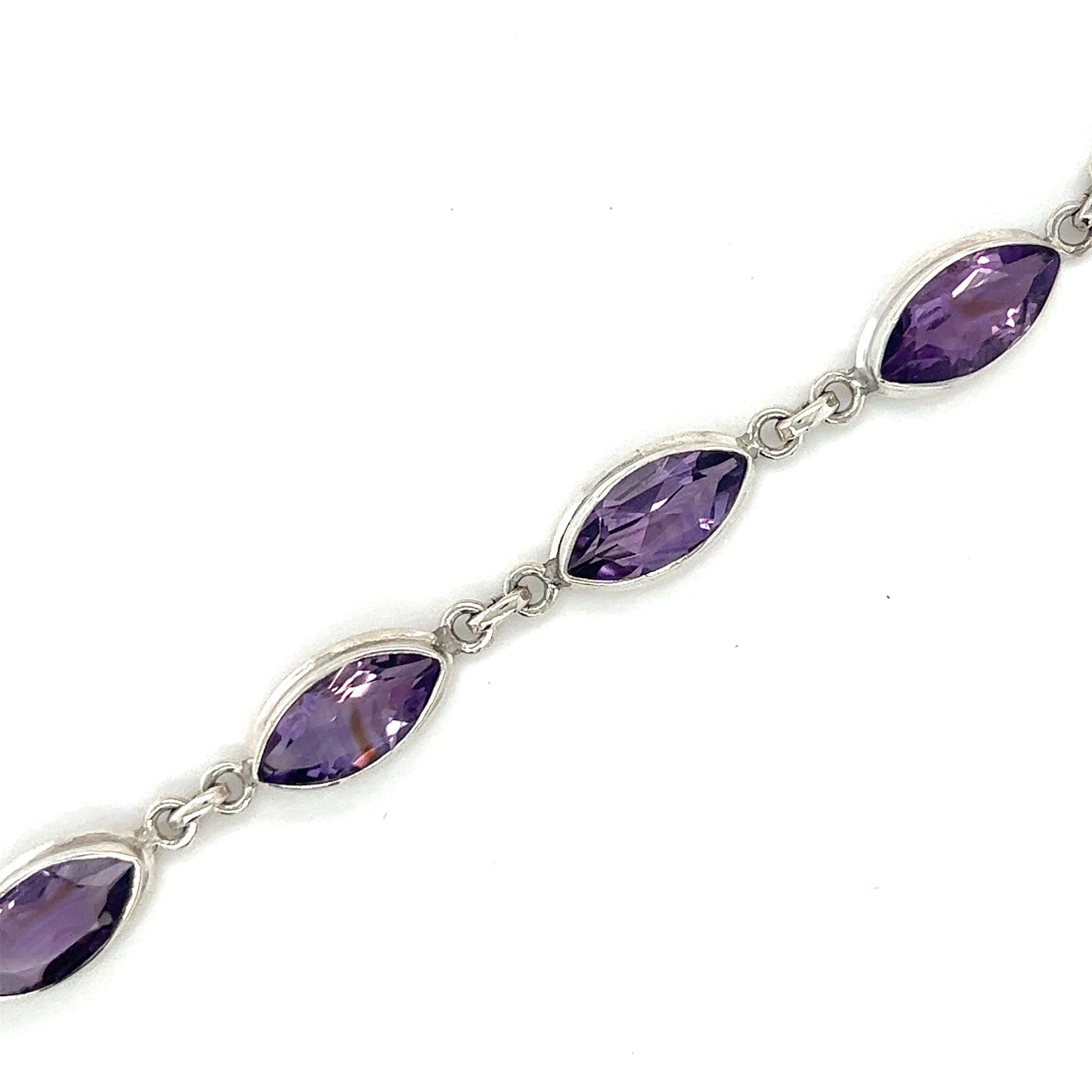 
                  
                    A Stunning Amethyst Marquise Shaped Bracelet by Super Silver, radiating creativity on a white background.
                  
                