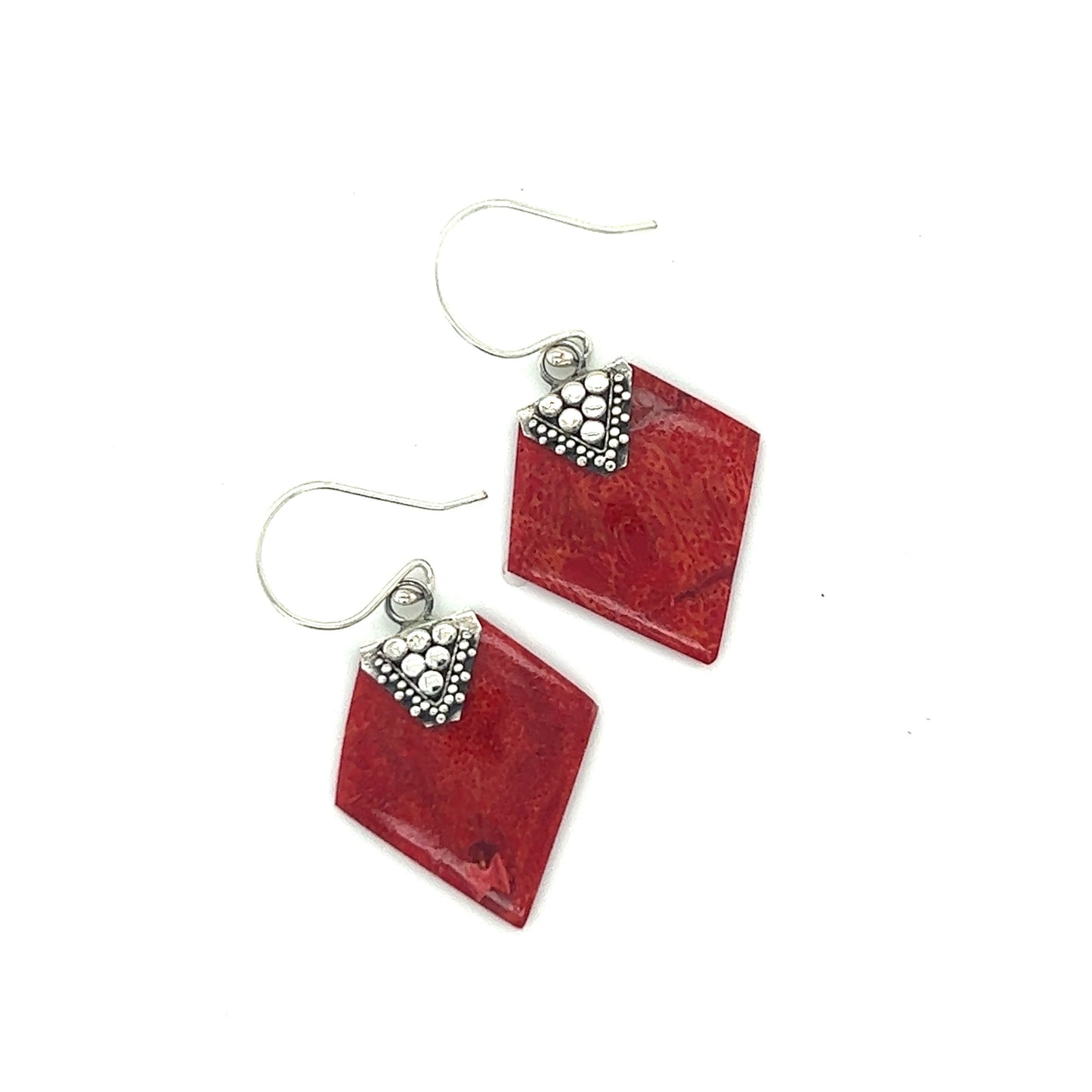 
                  
                    A pair of Super Silver Sponge Coral Diamond Earrings, featuring a Bali design in .925 Sterling Silver.
                  
                