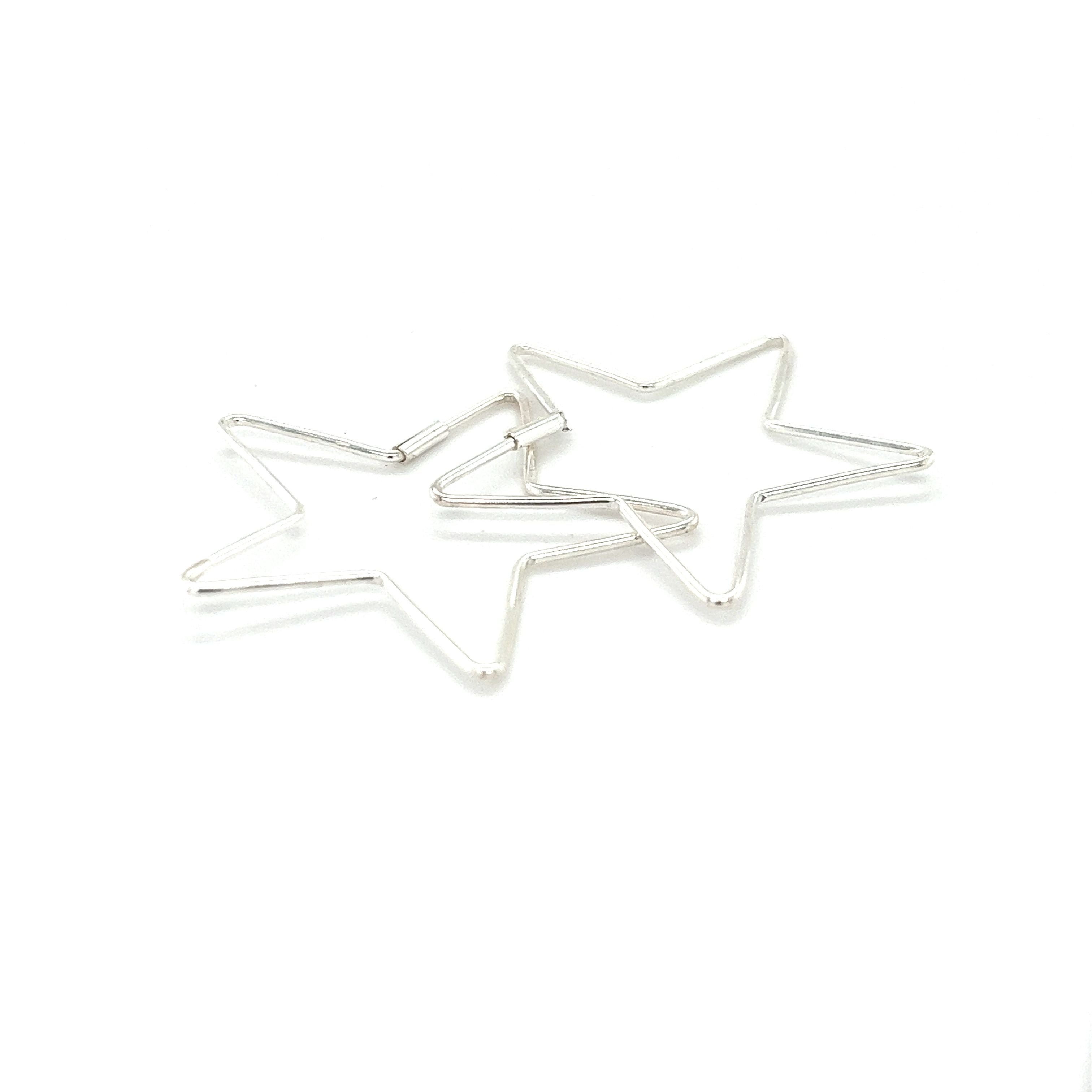 Two Super Silver Delicate Star Shaped Hoops on a white background.
