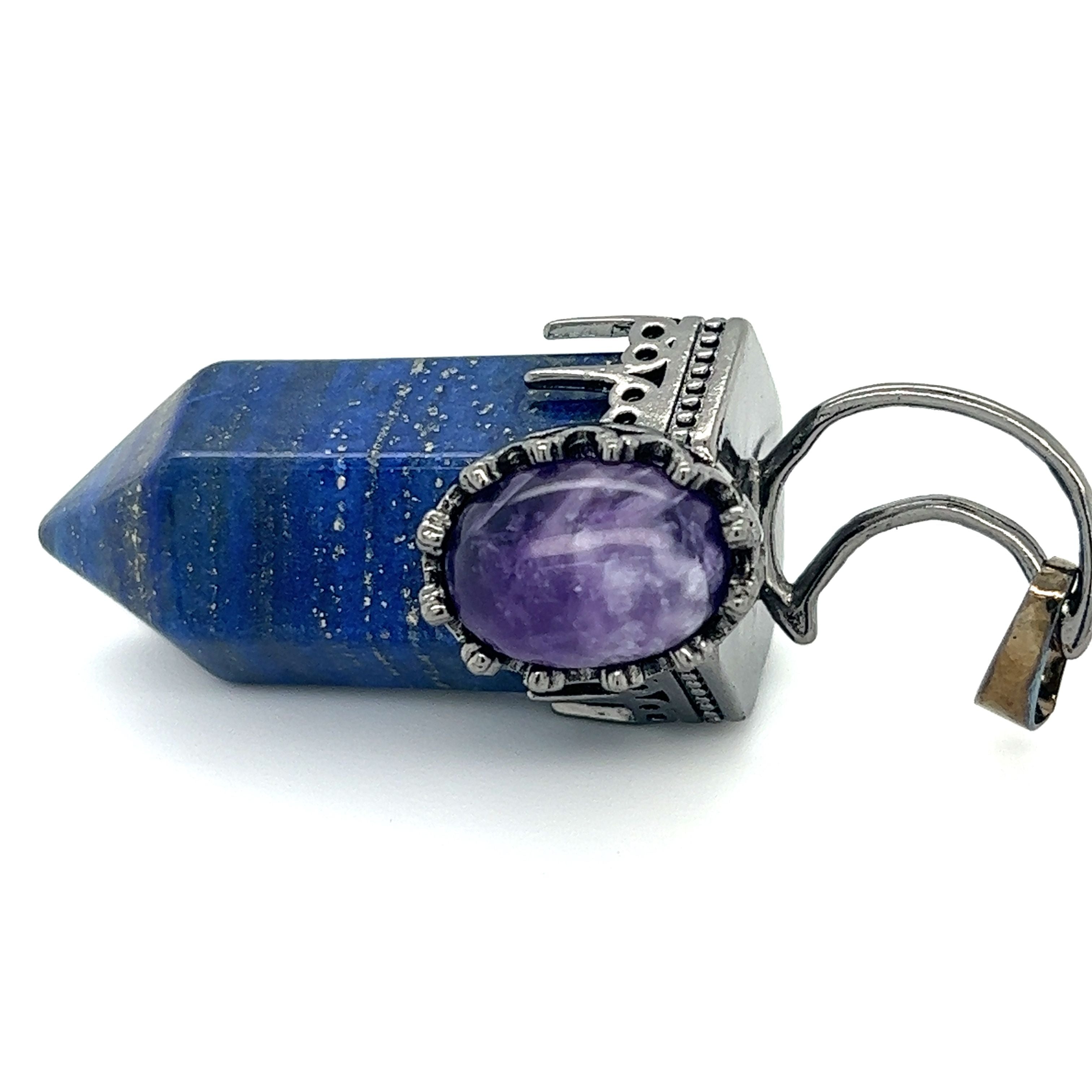 A Sodalite Crescent Moon Pendant with an Amethyst stone and a purple stone. [Brand Name: Super Silver]