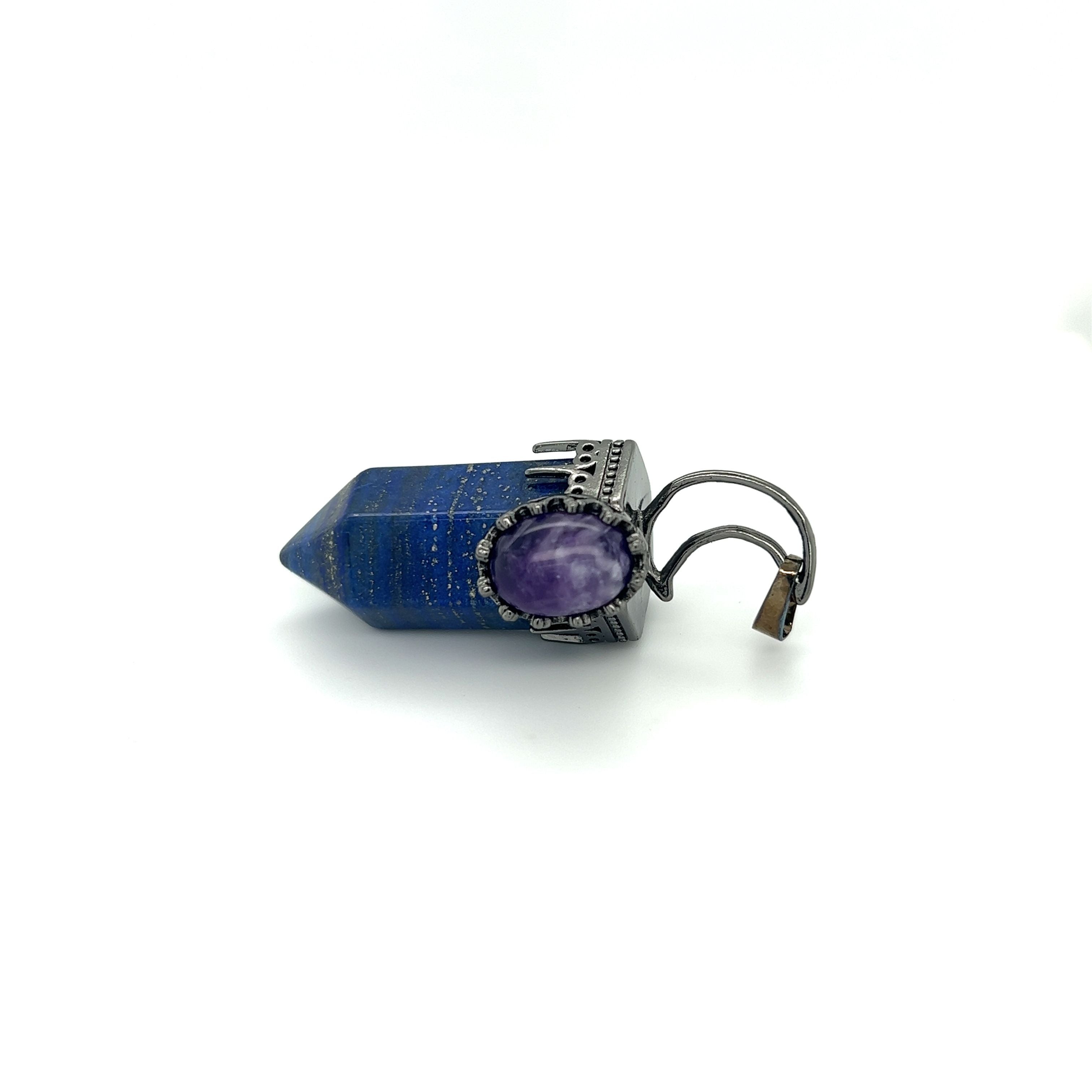 A Sodalite Crescent Moon Pendant with a Sodalite stone on it, made by Super Silver.