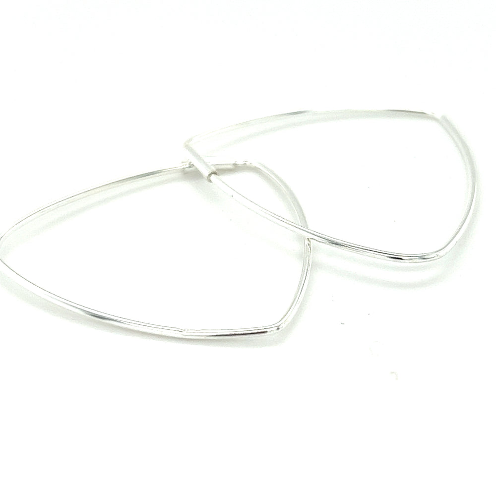 
                  
                    Delicate Triangle Shaped Hoops
                  
                