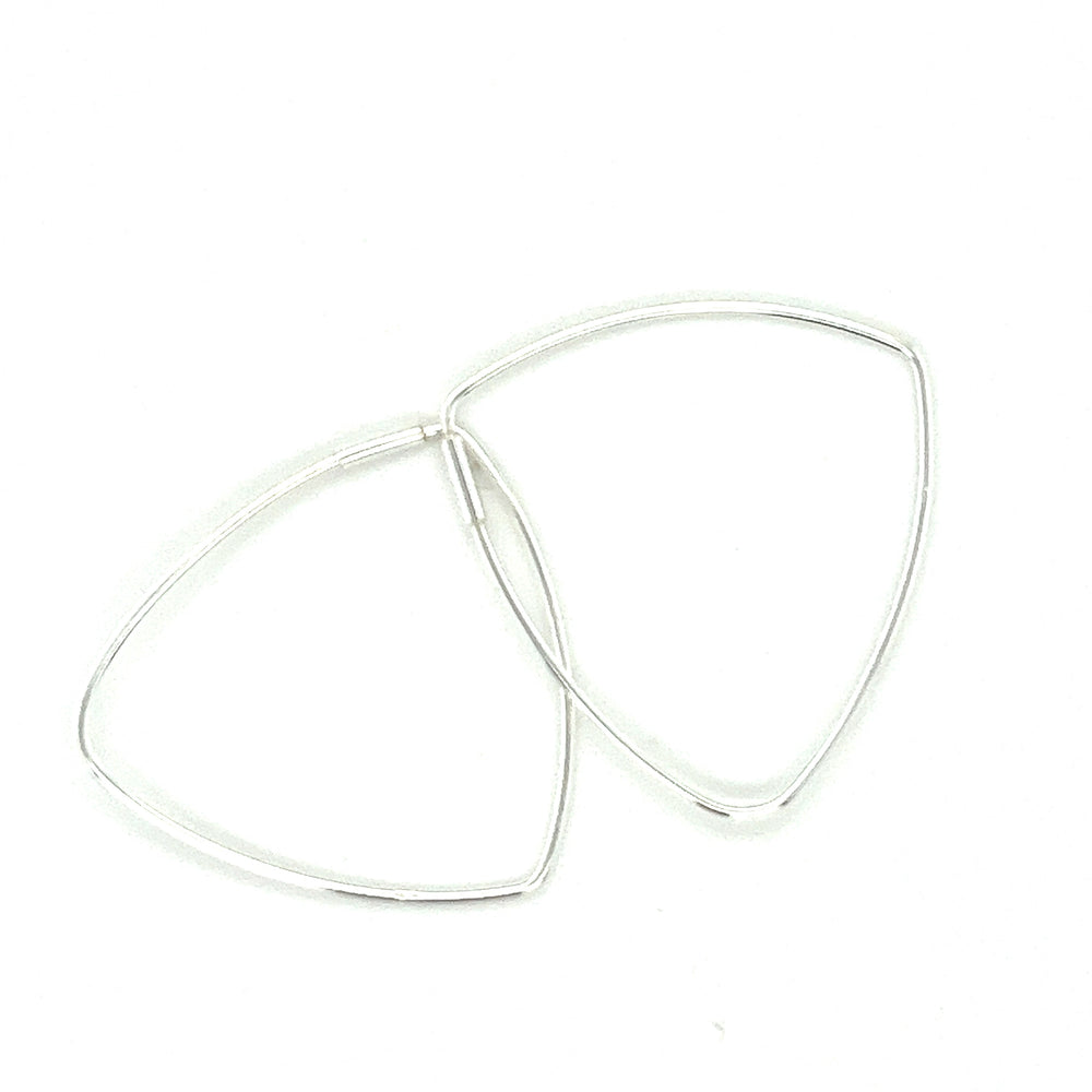 
                  
                    Delicate Triangle Shaped Hoops
                  
                