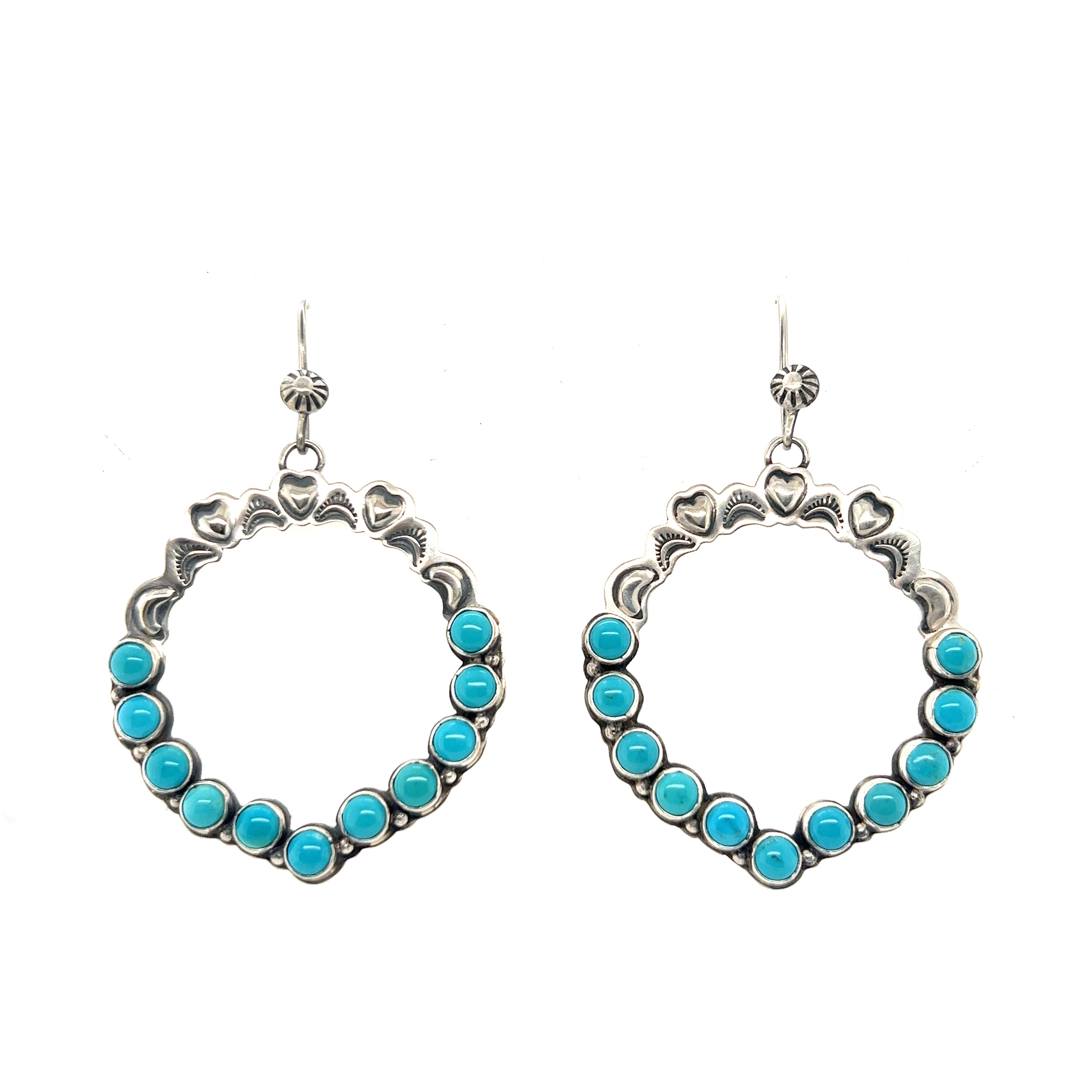 Statement Super Silver Handmade Turquoise Earrings exude southwestern elegance.