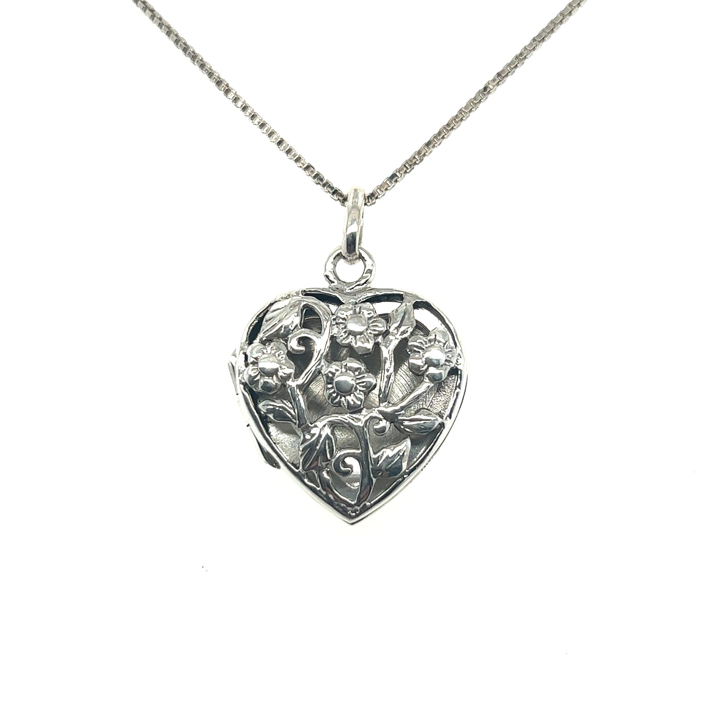 A sentimental gift with a vintage style, featuring a Super Silver Floral Open Heart Locket on a chain.
