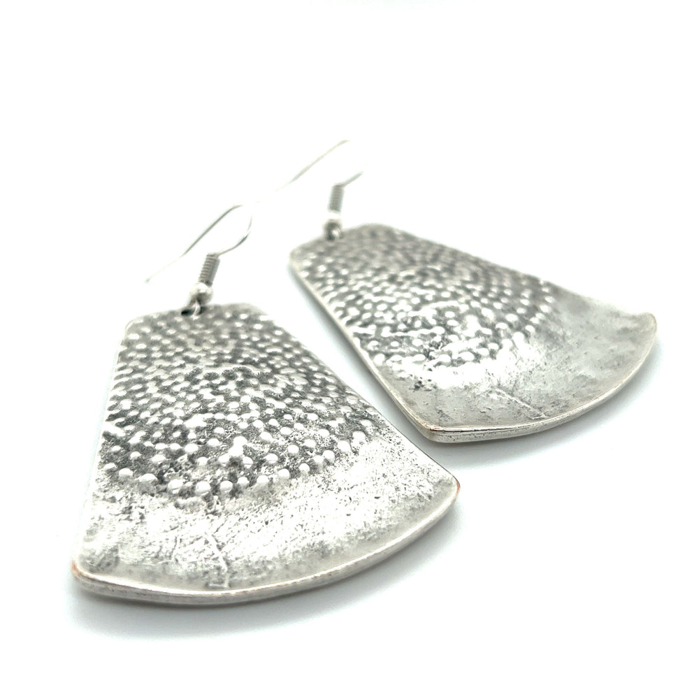 A pair of dramatic Super Silver Long Boho Statement Earrings on a white background.