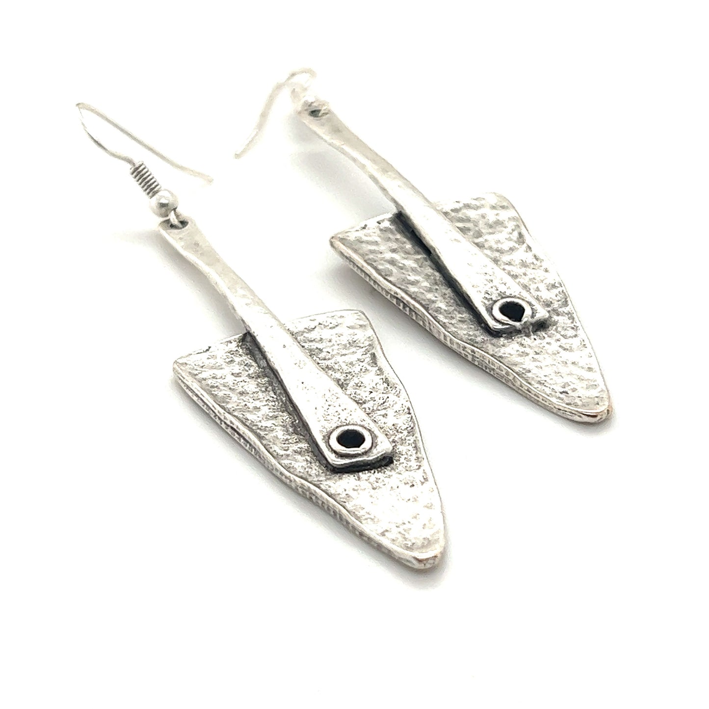 
                  
                    A pair of Super Silver Triangular Boho Statement Earrings with a silver and black Zamak stone in the middle.
                  
                