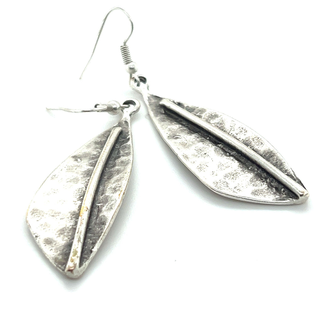 
                  
                    A pair of triangular boho statement earrings from Super Silver.
                  
                