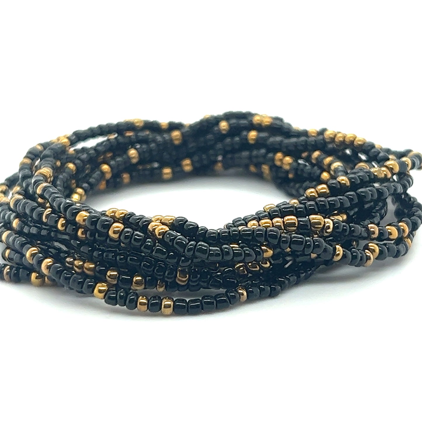 
                  
                    A Super Silver Dainty Beaded Bracelet in black and gold.
                  
                