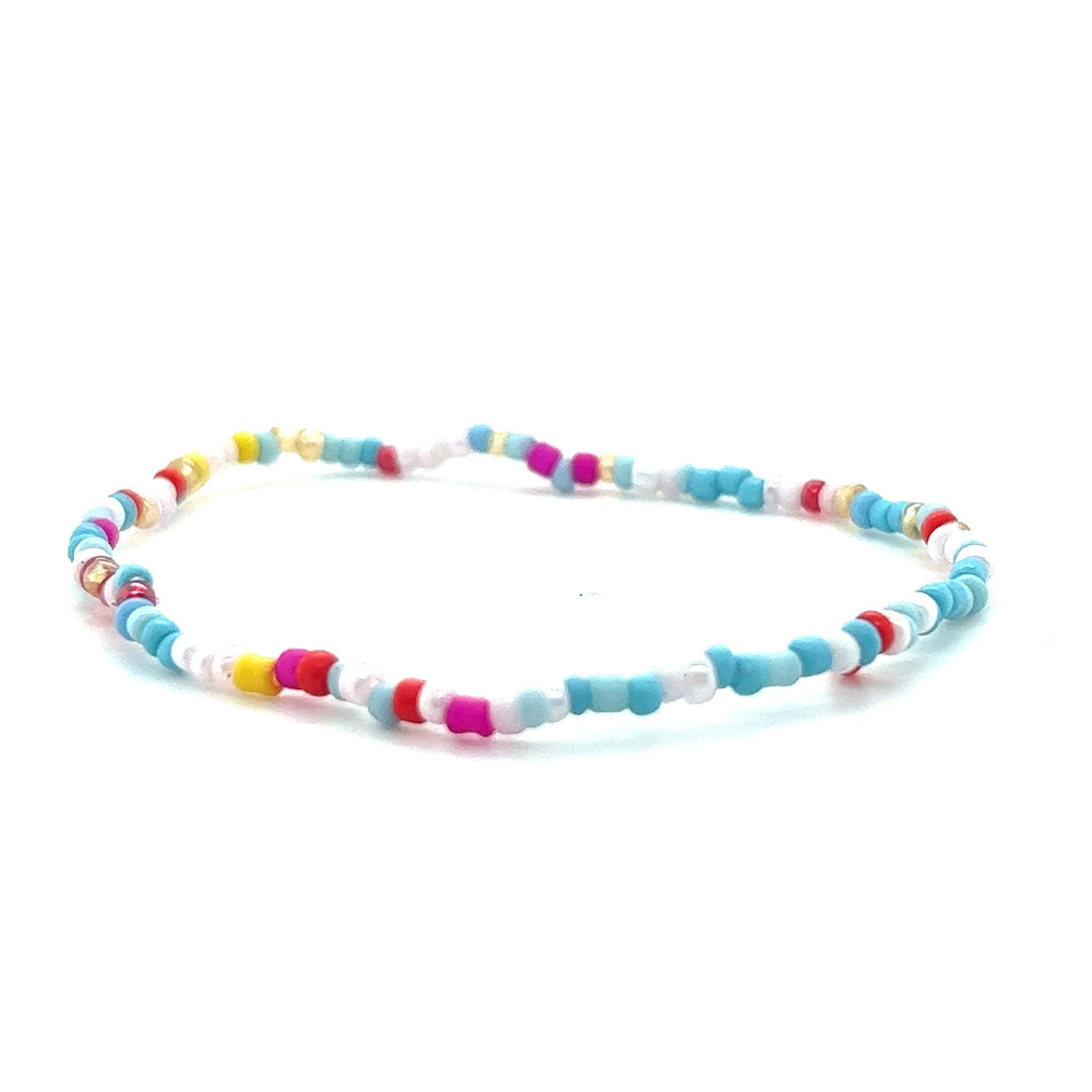 
                  
                    A vibrant Dainty Beaded Bracelet by Super Silver on a white background.
                  
                
