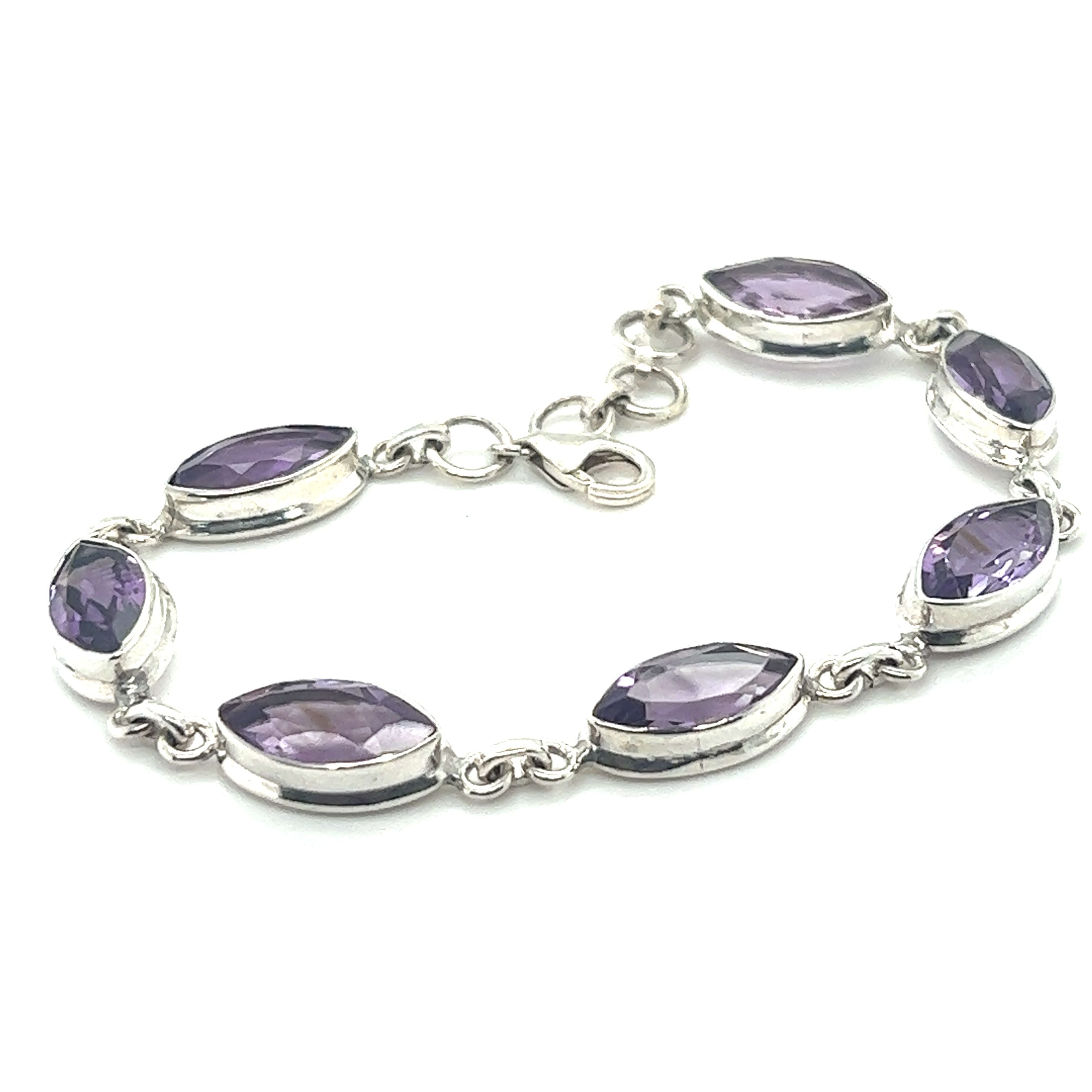 Enhance your creativity with this Stunning Amethyst Marquise Shaped Bracelet in sterling silver from Super Silver, known for its powerful healing properties.