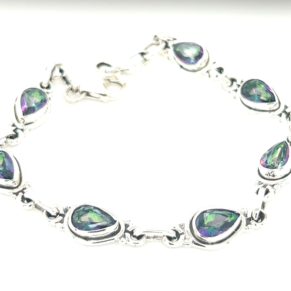 
                  
                    A Super Silver Rainbow Topaz Teardrop Bracelet with Mystic Topaz stones.
                  
                